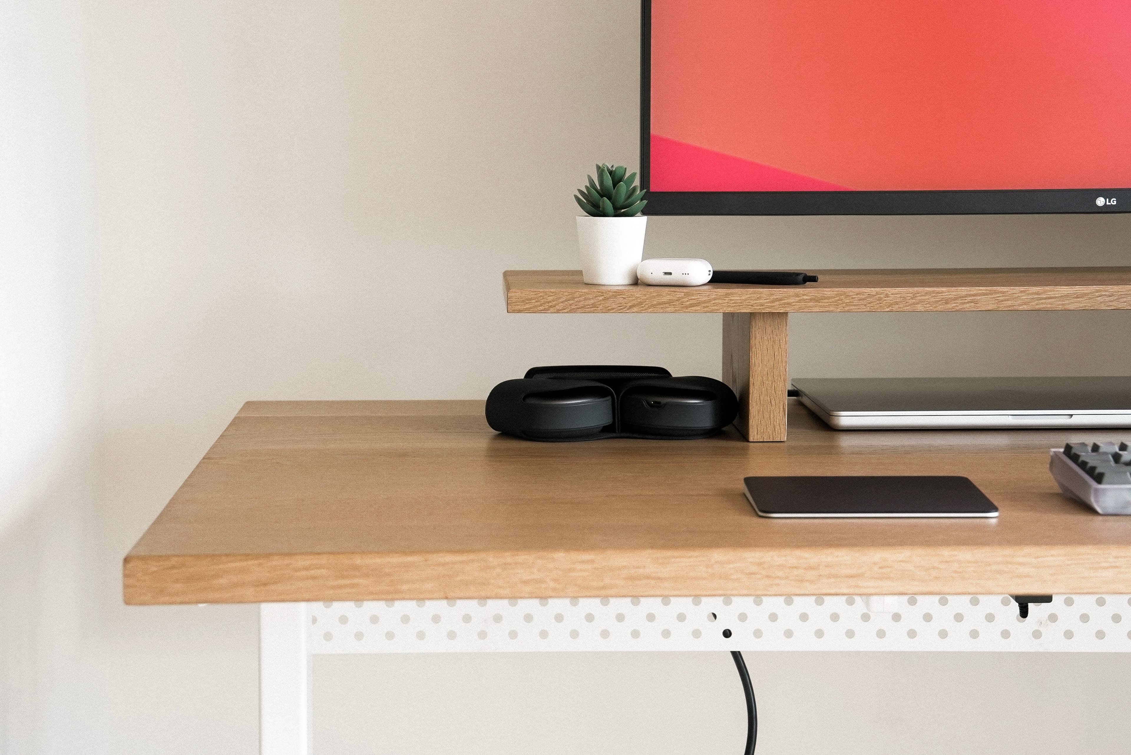 Desk setup with cable management rack